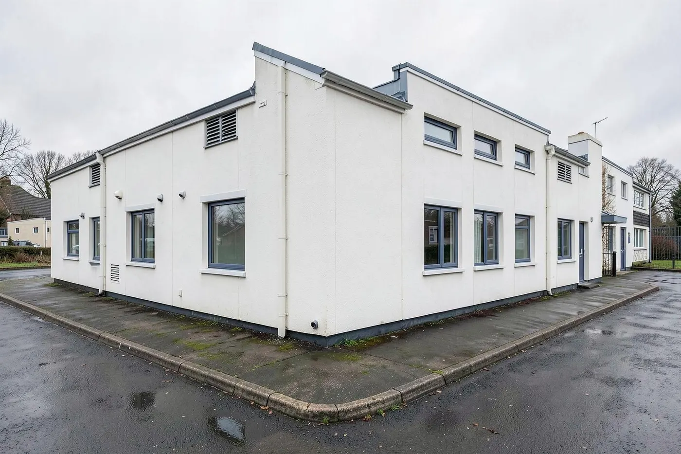 Commercial premises receiving low pressure softwashing