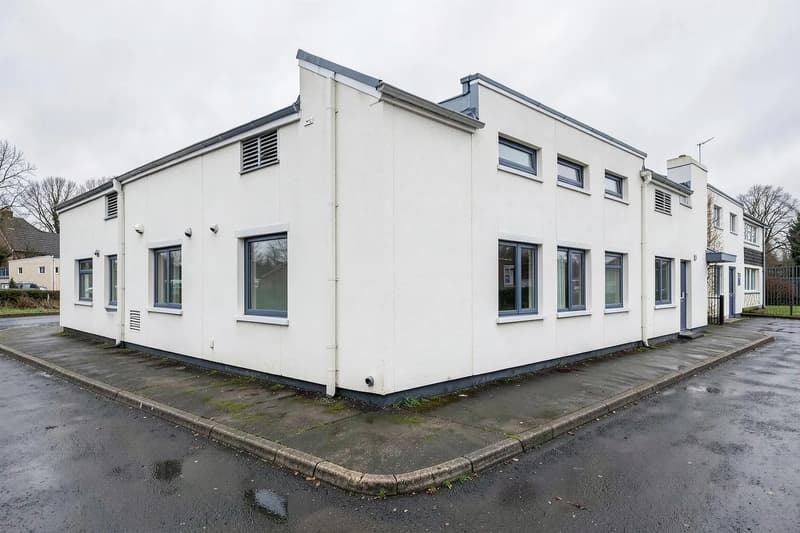Rendered exterior walls of a low-rise commercial building
