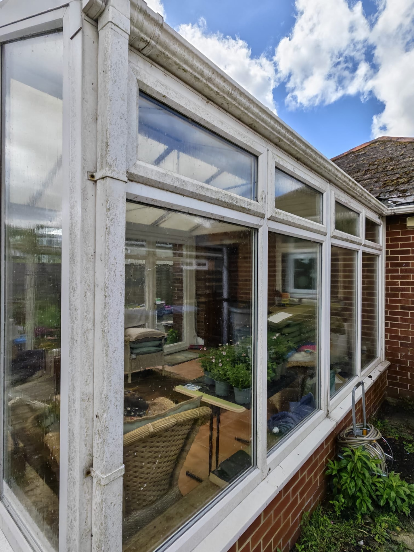 Weather-stained conservatory frames before cleaning by OOR External