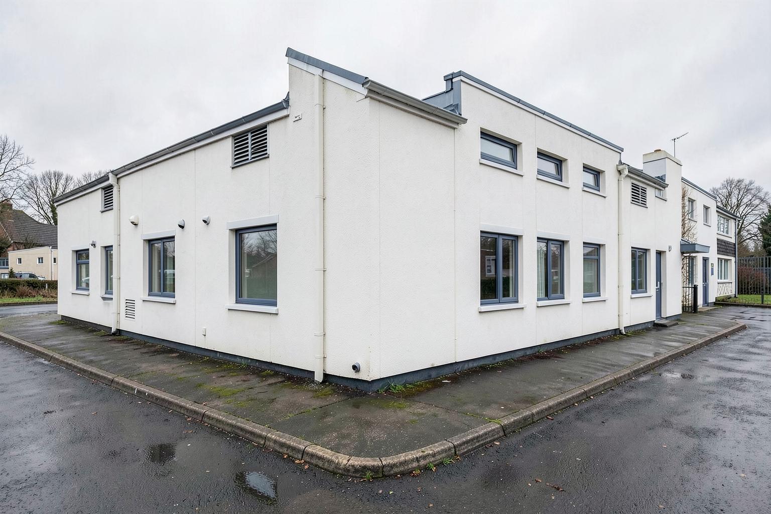 Commercial premises receiving low pressure softwashing